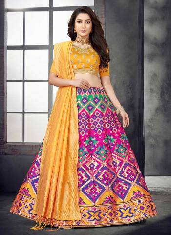 For A Designer Look,Grab These Lehenga Choli in Fine Colored.These Lehenga And Dupatta Are Fabricated On Banarasi Silk Pair With Modal Chanderi Blouse.Its Beautified With Wevon Designer,Mirror Embroidery Work.