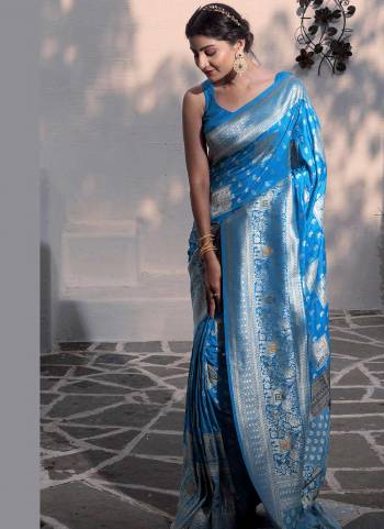 Grab These Saree in Fine Colored Pair With Blouse.These Saree and Blouse Are Fabricated On Dola Silk.Its Beautified With Heavy Wevon Designer Work .