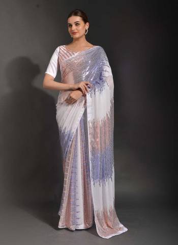 Attrective Look These Saree in Fine Colored.These Saree Are Georgette And Blouse is Art Silk Fabricated.Its Beautified With Designer Sequance Embroidery Work.