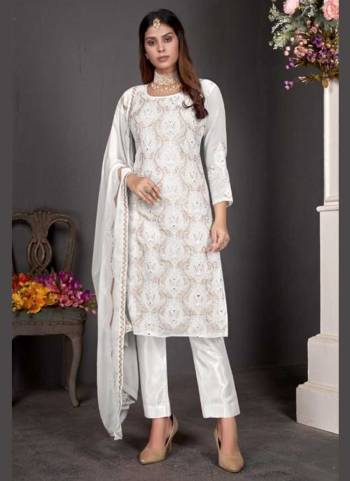 Grab These Suit in Fine Colored Pair With Bottom And Dupatta.These Top Are Faux Georgette And Dupatta Are Fabricated On Nazneen Pair With Santoon Bottom.Its Beautified With Santoon Bottom.Its Beautified With Heavy Designer Embroidery Work.