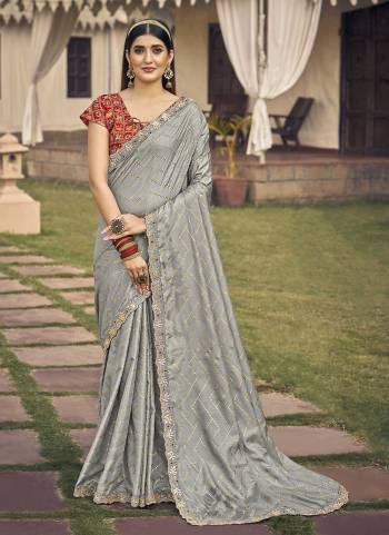 Attrective Looking These Party Wear Saree in Fine Colored.These Saree Are Soft Dola Silk And Blouse is Fabricated On Art Silk.Its Beautified With Designer Foil Printed,Gota Pati Embroidery,Diamond Work.