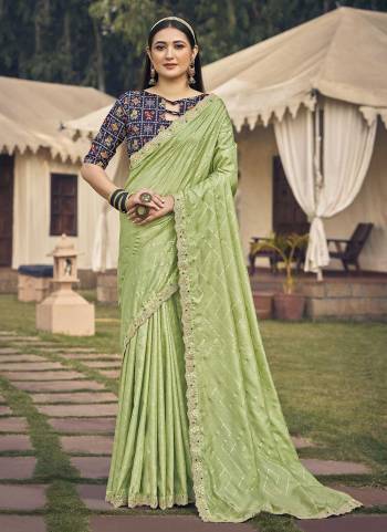 Attrective Looking These Party Wear Saree in Fine Colored.These Saree Are Soft Dola Silk And Blouse is Fabricated On Art Silk.Its Beautified With Designer Foil Printed,Gota Pati Embroidery,Diamond Work.