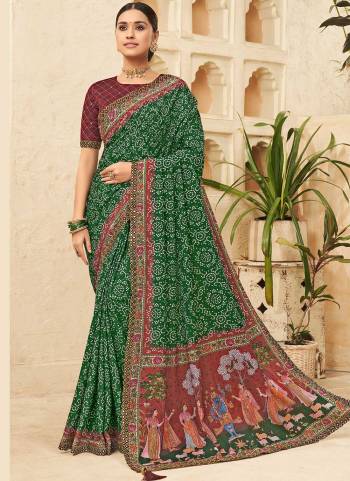 Attrective Looking These Saree in Fine Colored pair With Blouse.These Saree is Fabricated On Chinon Pair With Dhupoin Silk Blouse.Its Beautified With Bandhni Printed,Mirror, Sequance Embroidery Work.