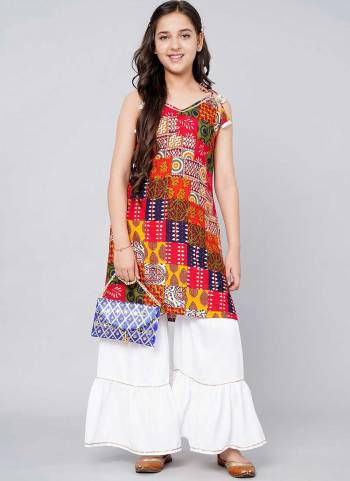 Grab These Beautiful Looking Readymade Kidswear  Kurti With Sharara.These Kurti is Fabricated On Rayon.Its Beautified With Designer Printed.