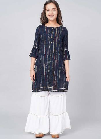 Grab These Beautiful Looking Readymade Kidswear  Kurti With Sharara.These Kurti is Fabricated On Rayon.Its Beautified With Designer Printed.