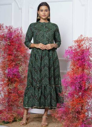 This Trendy yet Readymade Kurti Are Attractive Poduct Look Stylish Effortlessly. This Fine Color Rayon Fabriced with Bandhani Printed With Embroidery Work.