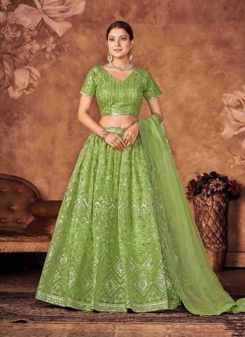 For A Designer Look,Grab These Lehenga Choli in Fine Colored.These Lehenga And Dupatta Are Fabricated On Organza Pair With Organza Blouse.Its Beautified With DesignerThread Embroidery Work.