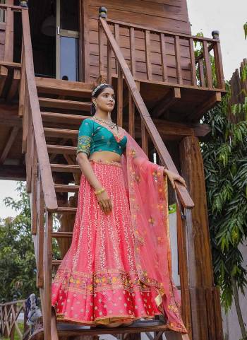 Garb This Partywear Fine Color Heavy Designer Choli Fabric Are Silk And Lahenga Net And Dupatta Net In Fabricated Beautified With Attrective Codding Embroidery,Diamond Work. Buy Now.