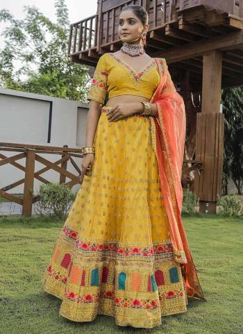 Garb This Partywear Fine Color Heavy Designer Choli Fabric Are Silk And Lahenga Net And Dupatta Net In Fabricated Beautified With Attrective Codding Embroidery,Diamond Work. Buy Now.