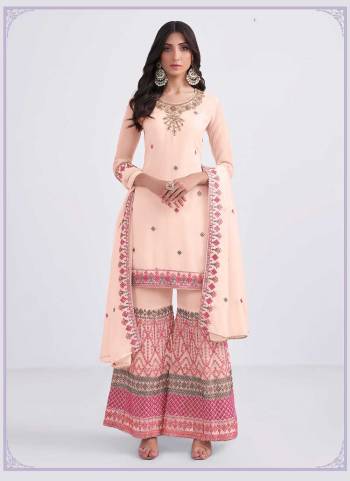 Grab These Designer Sharara Suit in Fine Colored Pair With Bottom And Dupatta.These Top,Bottom And Dupatta Are Fabricated On Georgette Pair With Dull Santoon Inner.Its Beautified With Heavy Designer Muity Thread ,Sequance Embroidery,Khatli Work.