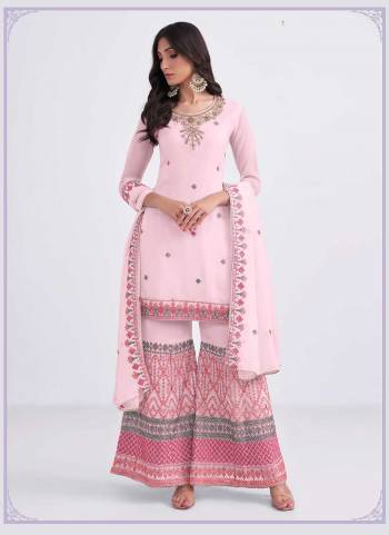 Grab These Designer Sharara Suit in Fine Colored Pair With Bottom And Dupatta.These Top,Bottom And Dupatta Are Fabricated On Georgette Pair With Dull Santoon Inner.Its Beautified With Heavy Designer Muity Thread ,Sequance Embroidery,Khatli Work.