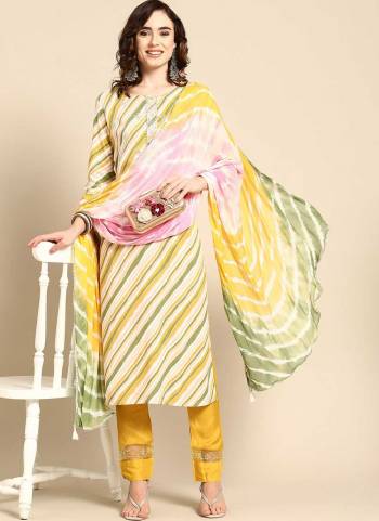 Grab These Readymade Suit in Fine Colored Pair With Bottom And Dupatta.These Top And Bottom Are Fabricated On Rayon Pair With Chiffon Dupatta.Its Beautified With Designer Laheriya Printed With Thread Embroidery Work.