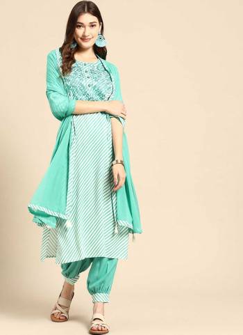 Grab These Readymade Suit in Fine Colored Pair With Bottom And Dupatta.These Top And Bottom Are Fabricated On Rayon Pair With Chiffon Dupatta.Its Beautified With Designer Laheriya Printed With Thread Embroidery Work.