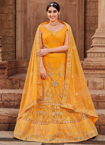 Garb This Partywear Fine Color Heavy Designer Choli Fabric Are Net And Lahenga Net And Dupatta Net In Fabricated Beautified With Attrective Jari,Mirror Embroidery Work. Buy Now.