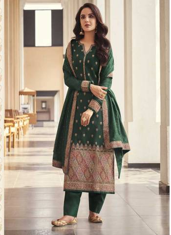 Garb These Suit in Fine Colored Pair With Bottom And Dupatta.These Top And Dupatta Are Viscose Silk And Pair With Dull Santoon Bottom.Its Beautified With Dull Santoon Inner.Its Beautified With Heavy Jacquard Designer.