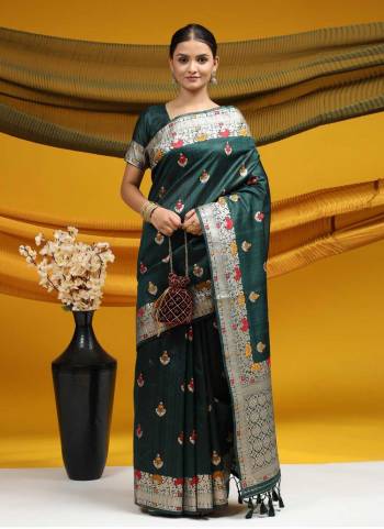 Garb These Festive Wear Saree in Fine Colored.These Saree And Blouse is Fabricated On Tussar Silk.Its Beautified With Weavon Ikkat And Meena Designer.