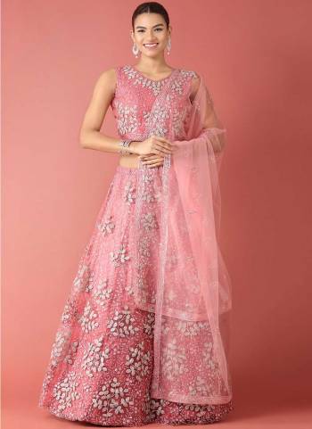 Garb This Partywear Fine Color Heavy Designer Choli Fabric Are Net And Lahenga Net And Dupatta Net In Fabricated Beautified With Attrective Embroidery Work. Buy Now.