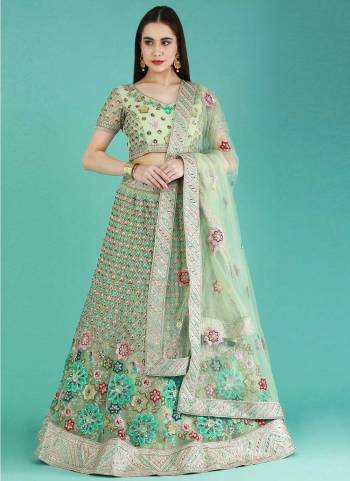 Garb This Partywear Fine Color Heavy Designer Choli Fabric Are Net And Lahenga Net And Dupatta Net In Fabricated Beautified With Attrective Embroidery Work. Buy Now.