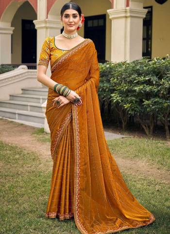 Grab These Party Wear Saree in Fine Colored.These Saree Are Chiffon And Blouse is Fabricated On Jacquard Silk.Its Beautified With Swarovski ,Embroidery Work.