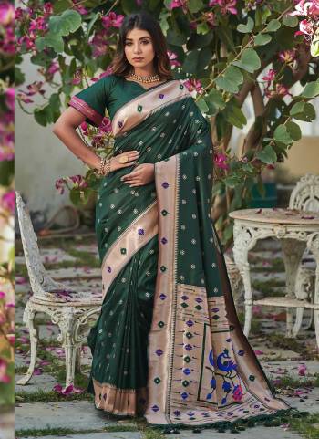 Garb These Festive Wear Saree in Fine Colored.These Saree And Blouse is Fabricated On Banarasi Soft Silk.Its Beautified With Weavon Paithani Jari Designer.