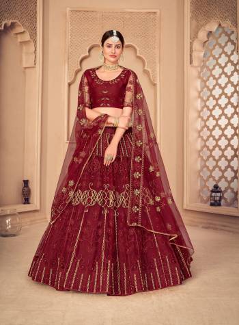 For A Designer Look,Grab These Lehenga Choli in Fine Colored.These Lehenga Choli Are Net And Dupatta Are Fabricated On Net Pair.Its Beautified With Fancy Designer Multy Thread Embroidery,Diamond Work.