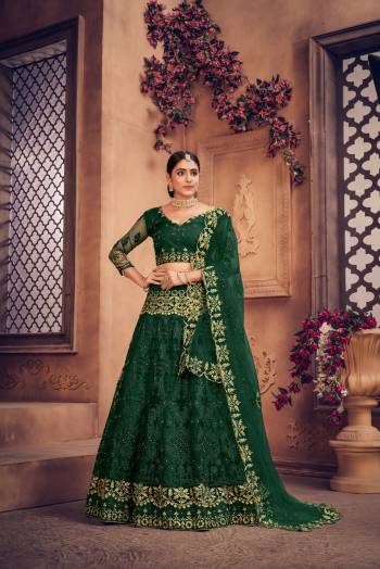 For A Designer Look,Grab These Lehenga Choli in Fine Colored.These Lehenga Choli Are Net And Dupatta Are Fabricated On Net Pair.Its Beautified With Fancy Designer Multy Thread Embroidery,Diamond Work.