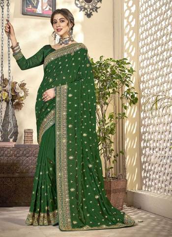 Garb These Designer Saree in Fine Colored.These Saree And Blouse is Fabricated On Vichitra Silk Pair.Its Beautified With Jari Embroidery,Diamond Work.