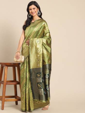 Grab These Festive Wear Saree in Fine Colored.These Saree And Blouse  is Fabricated On Silk Blend.Its Beautified With Wevon Jari Designer