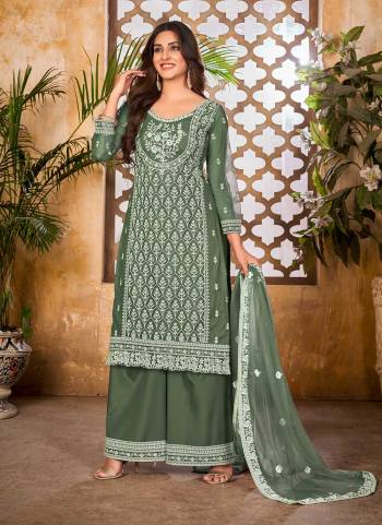 Grab These Plazzo Suit in Fine Dusty Colored Pair With Bottom And Dupatta.These Top And Dupatta Are Fabricated On Net Pair With Santoon Bottom.Its Beautified With Santoon Inner.Its Beautified With Heavy Designer Thread Embroidery Work.