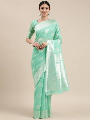 Look These Fancy Saree in Fine Colored.These Saree And Blouse is Fabricated On Linen Cotton Pair.Its Beautified With Wevon Jacquard Designer.