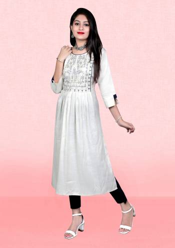 Attrective This Readymade Long Kurti In Fine Color Fabricated On Two Tone Rayon Beautified With Designer Embroidery Work. It Is Light In Weight And Easy To Carry All Day Long. 