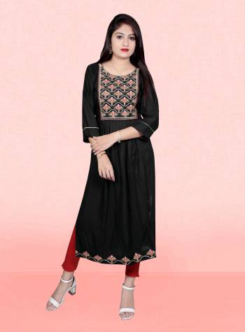 Attrective This Readymade Long Kurti In Fine Color Fabricated On Rayon Beautified With Designer Embroidery Work. It Is Light In Weight And Easy To Carry All Day Long. 