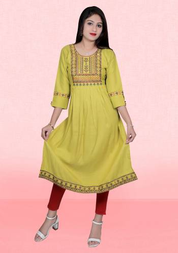 Attrective This Readymade Long Kurti In Fine Color Fabricated On Two Tone Rayon Beautified With Designer Embroidery Work. It Is Light In Weight And Easy To Carry All Day Long. 