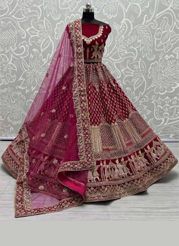 For A Designer Look,Grab These Lehenga Choli in Fine Colored.These Lehenga Choli Are Velvet And Dupatta Are Fabricated On Soft Net Pair.Its Beautified With Fancy Designer Multy Thread,Dori Embroidery,Zarkan Diamond Work.