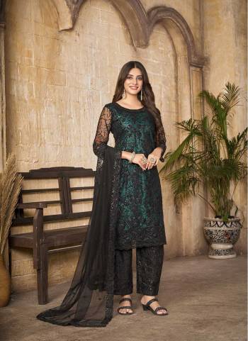 Grab These Pant Suit in Fine Colored Pair With Bottom And Dupatta.These Top And Dupatta Are Fabricated On Net Pair With Santoon Bottom.Its Beautified With Satin Inner.Its Beautified With Heavy Designer Black Sequance Embroidery Work.