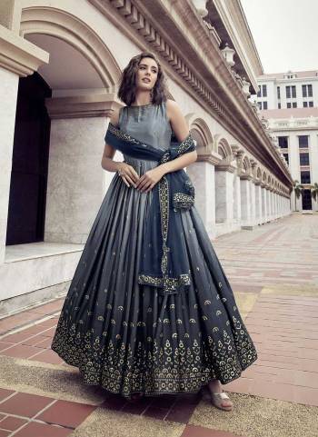 Grab These Beautiful Looking Designer Gown With Dupatta.These Gown is Chinon And Dupatta Is Fabricated On Net.Its Beautified With Thread And Sequance Embroidery Work.