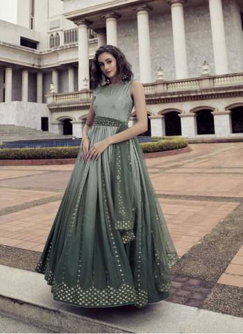 Grab These Beautiful Looking Designer Gown With Dupatta.These Gown is Chinon And Dupatta Is Fabricated On Net.Its Beautified With Thread And Sequance Embroidery Work.