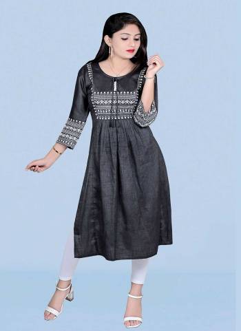 Attrective This Readymade Long Kurti In Fine Color Fabricated On Two Tone Rayon Beautified With Designer Thread Embroidery Work. It Is Light In Weight And Easy To Carry All Day Long. 