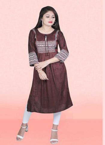 Attrective This Readymade Long Kurti In Fine Color Fabricated On Two Tone Rayon Beautified With Designer Thread Embroidery Work. It Is Light In Weight And Easy To Carry All Day Long. 