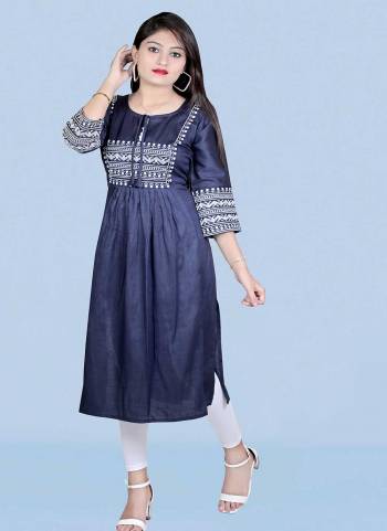 Attrective This Readymade Long Kurti In Fine Color Fabricated On Two Tone Rayon Beautified With Designer Thread Embroidery Work. It Is Light In Weight And Easy To Carry All Day Long. 