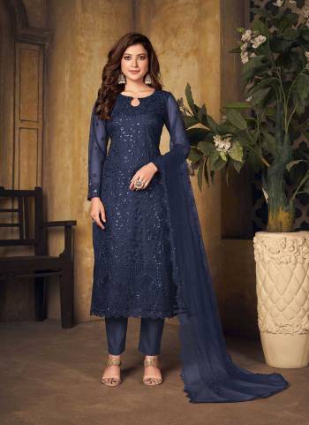 Grab These Suit in Fine Colored Pair With Bottom And Dupatta.These Top And Dupatta Are Fabricated On Net Pair With Santoon Bottom.Its Beautified With Santoon Inner.Its Beautified With Heavy Designer Thread,Sequance Embroidery Work.