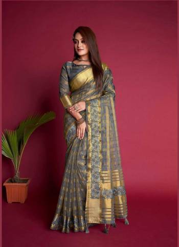 Looking These Festive Wear Saree in Fine Colored.These Saree And Blouse is Fabricated On Organza Silk.Its Beautified With Weavon Jari Checks Designer With Embroidery Work.