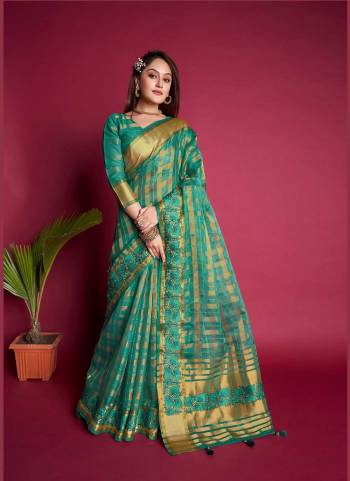 Looking These Festive Wear Saree in Fine Colored.These Saree And Blouse is Fabricated On Organza Silk.Its Beautified With Weavon Jari Checks Designer With Embroidery Work.