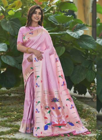 Garb These Festive Wear Saree in Fine Colored.These Saree And Blouse is Fabricated On Banarasi Soft Silk.Its Beautified With Weavon Paithani Jari Designer.