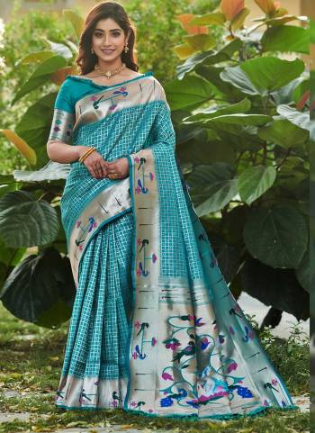 Garb These Festive Wear Saree in Fine Colored.These Saree And Blouse is Fabricated On Banarasi Soft Silk.Its Beautified With Weavon Paithani Jari Designer.