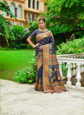 Garb These Festive Wear Saree in Fine Colored.These Saree And Blouse is Fabricated On Pashmina Silk.Its Beautified With Weavon Colorfull Meena Designer.