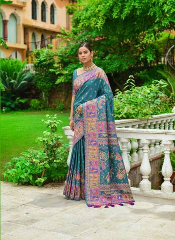 Garb These Festive Wear Saree in Fine Colored.These Saree And Blouse is Fabricated On Pashmina Silk.Its Beautified With Weavon Colorfull Meena Designer.