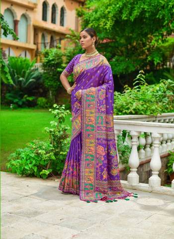 Garb These Festive Wear Saree in Fine Colored.These Saree And Blouse is Fabricated On Pashmina Silk.Its Beautified With Weavon Colorfull Meena Designer.