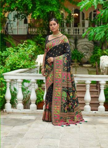 Garb These Festive Wear Saree in Fine Colored.These Saree And Blouse is Fabricated On Pashmina Silk.Its Beautified With Weavon Colorfull Meena Designer.