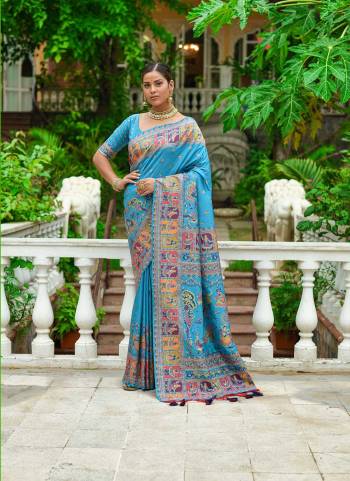 Garb These Festive Wear Saree in Fine Colored.These Saree And Blouse is Fabricated On Pashmina Silk.Its Beautified With Weavon Colorfull Meena Designer.